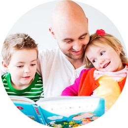 close_up_dad_kids_reading_circle